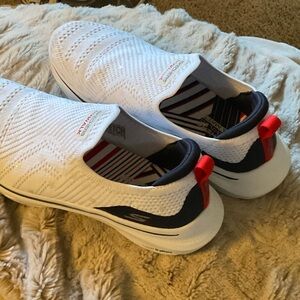 Skechers White and Navy Go Walk Slip-On Sneakers